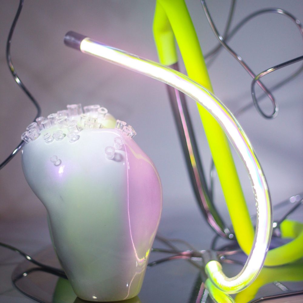 2023 | Tumpuk Lapis, Tampak Isi : Laras 10 | 32 x 40 x 37 cm | resin, acrylic, neon lights