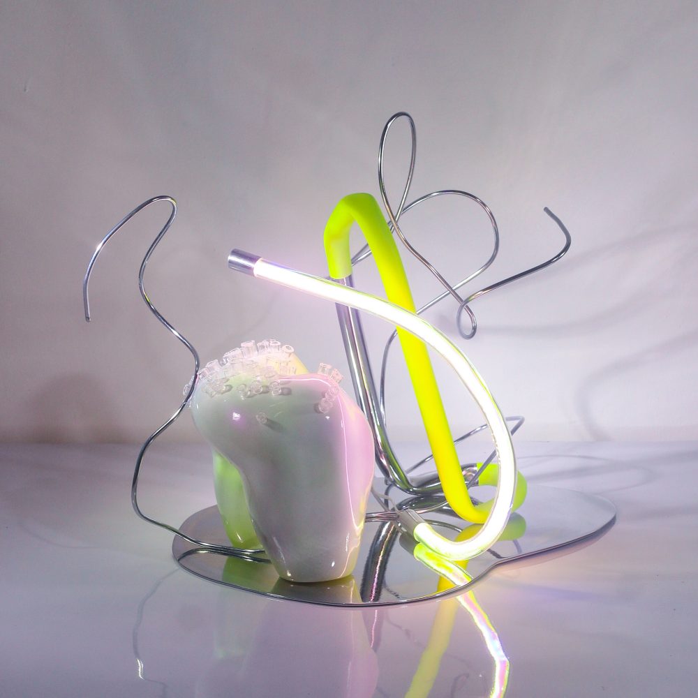 2023 | Tumpuk Lapis, Tampak Isi : Laras 10 | 32 x 40 x 37 cm | resin, acrylic, neon lights